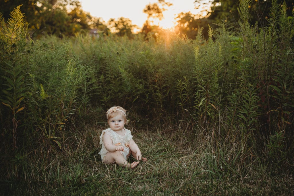 baby girl at sunset