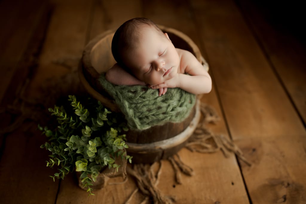 Palatine newborn photographer, baby boy asleep in bucket