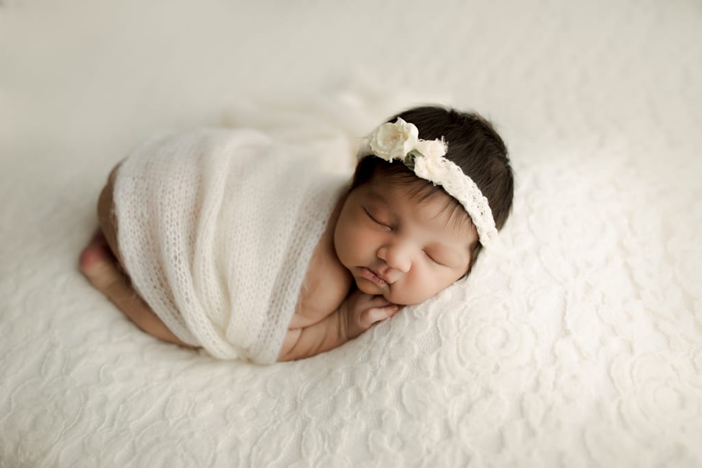 Chicago baby pictures, baby girl with white blanket and headband