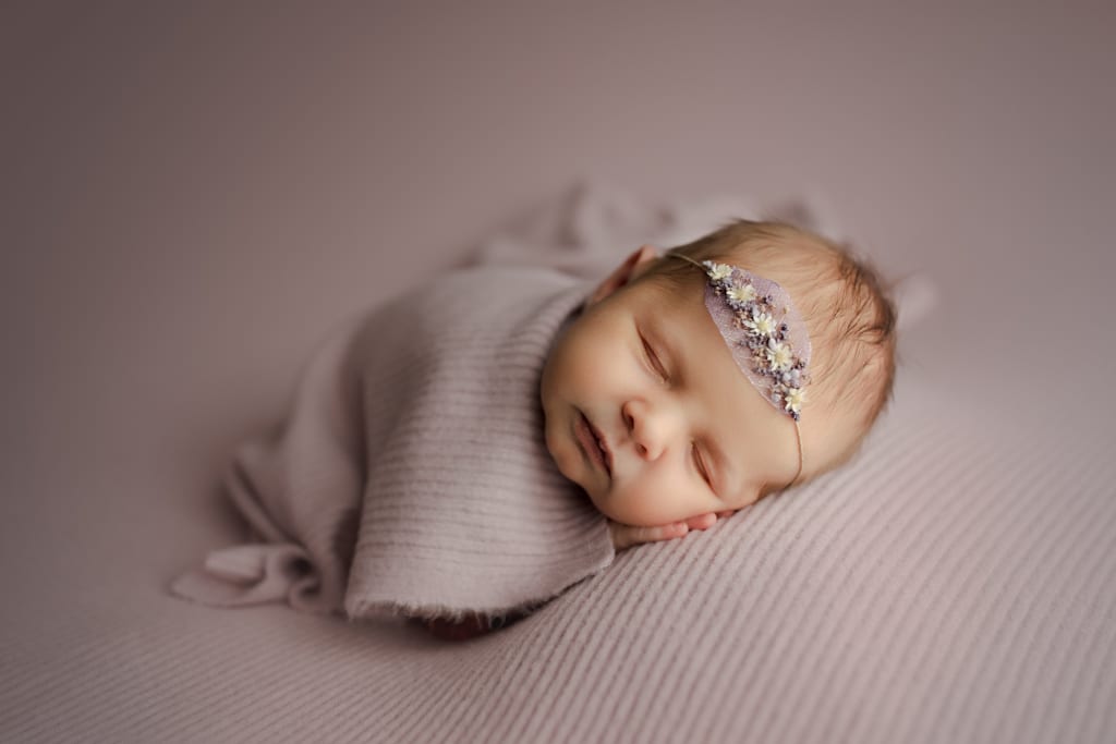 Chicago area baby photographers, baby in lavender with flower headband