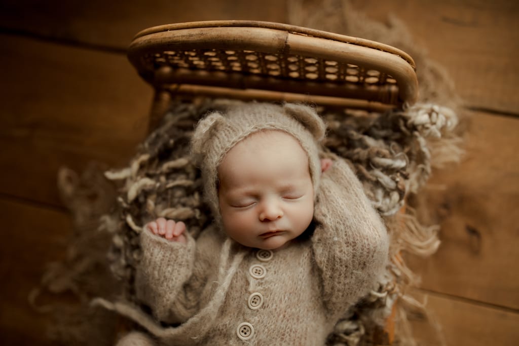 newborn boy in bear outfit, Chicago newborn photography