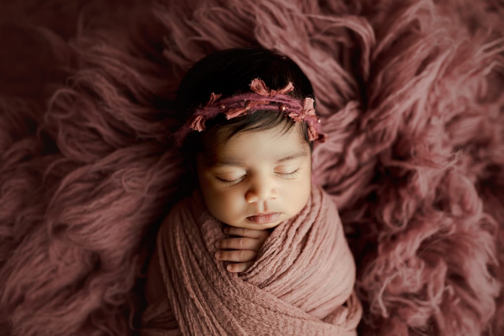 Chicago baby photographer, newborn in mauve swaddle and headband