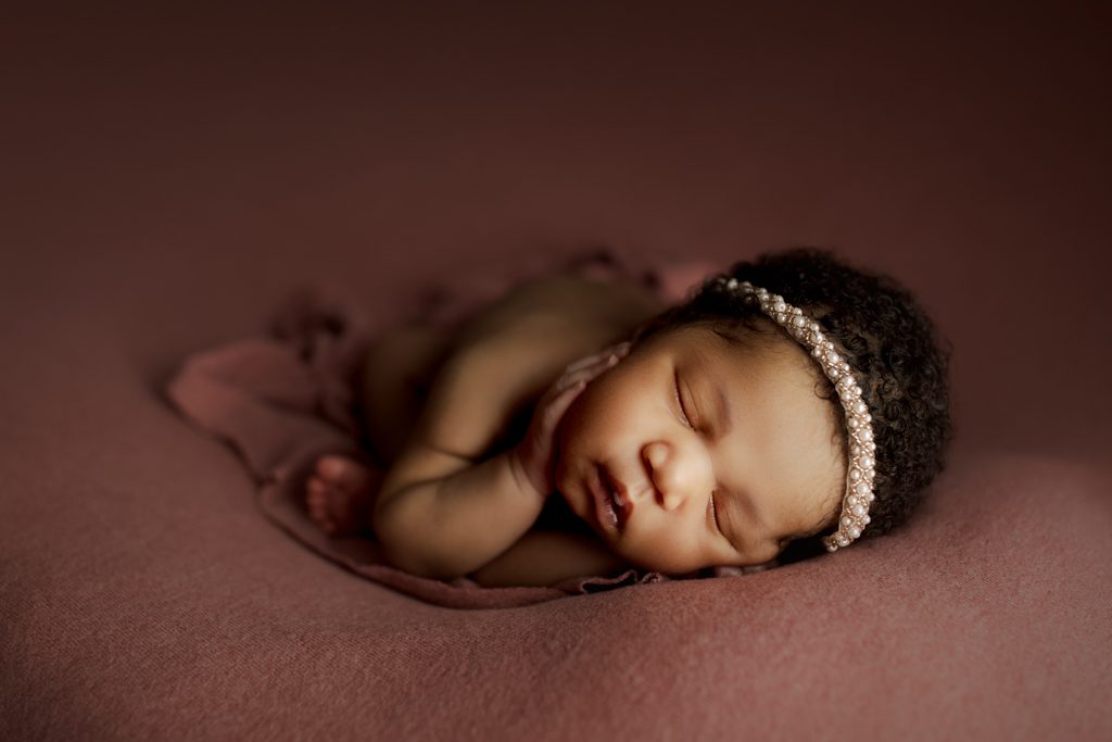 newborn baby girl in newborn studio Chicago