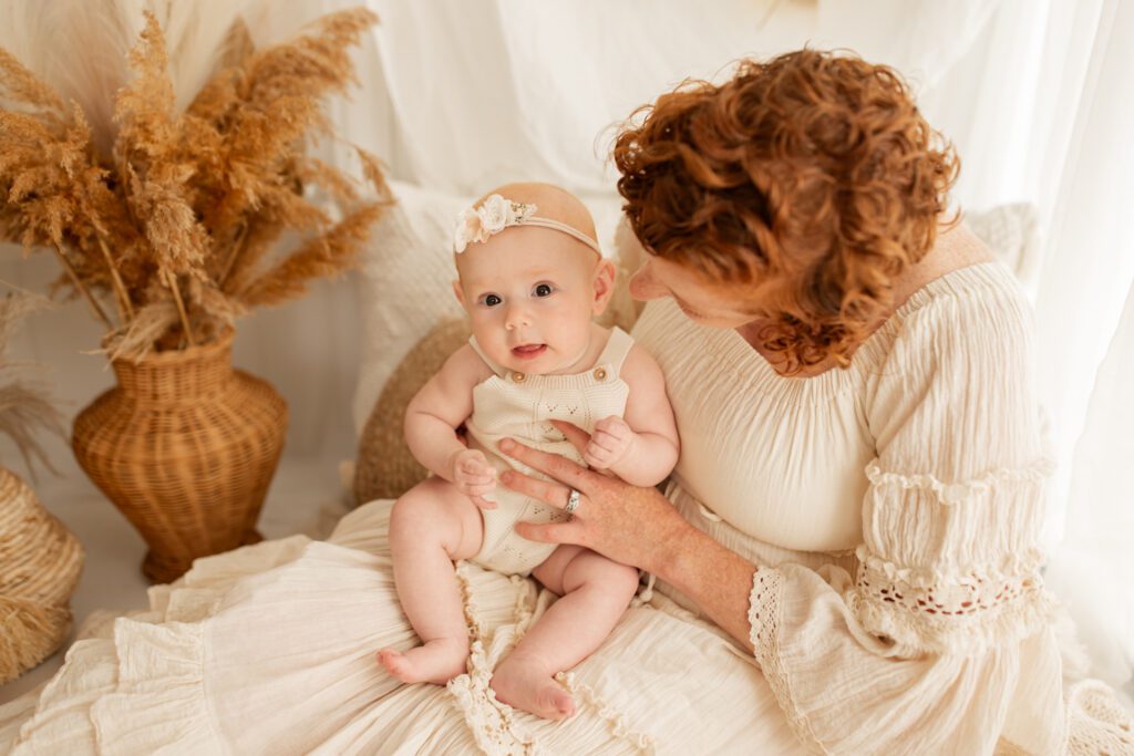 Mother holding baby in Long Grove, IL photography studio