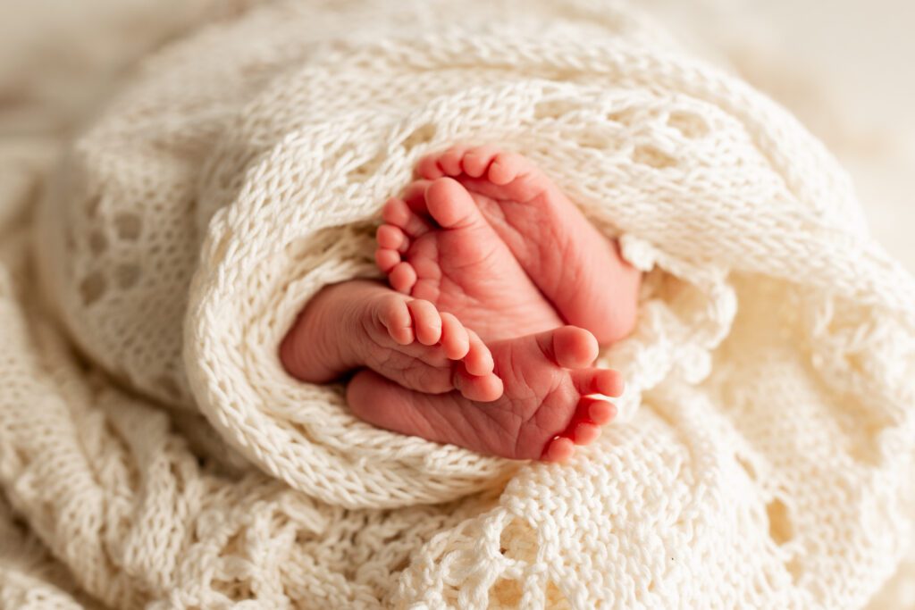 Closeup of baby feet, twins newborn photographer near Chicago