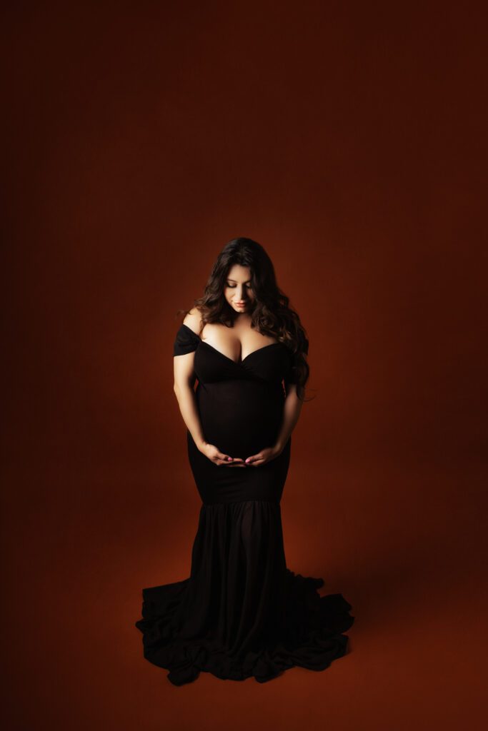 Mother-to-be in black maternity dress