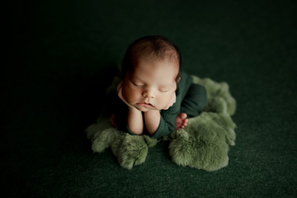 Chicago newborn photos with 8-day-old baby boy on faux fur rug
