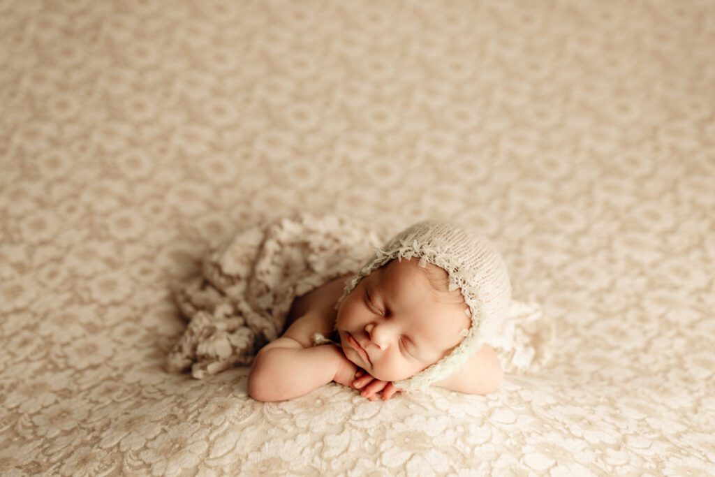 Baby girl sleeping through her Buffalo Grove baby pictures photo session